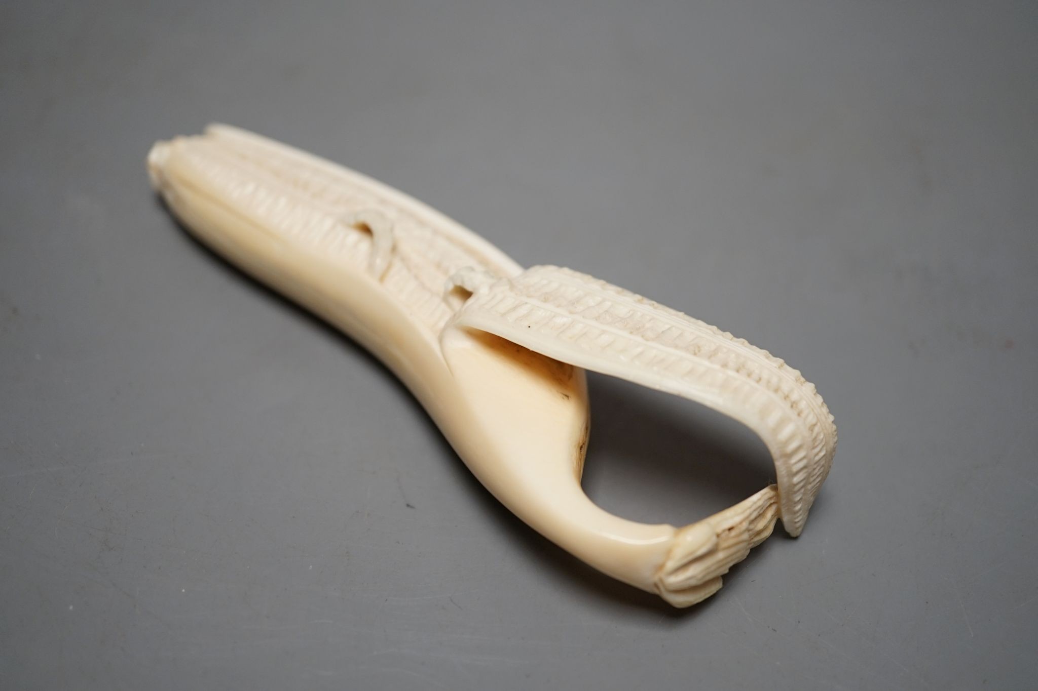 A Japanese ivory model of a banana, Meiji period 12cm